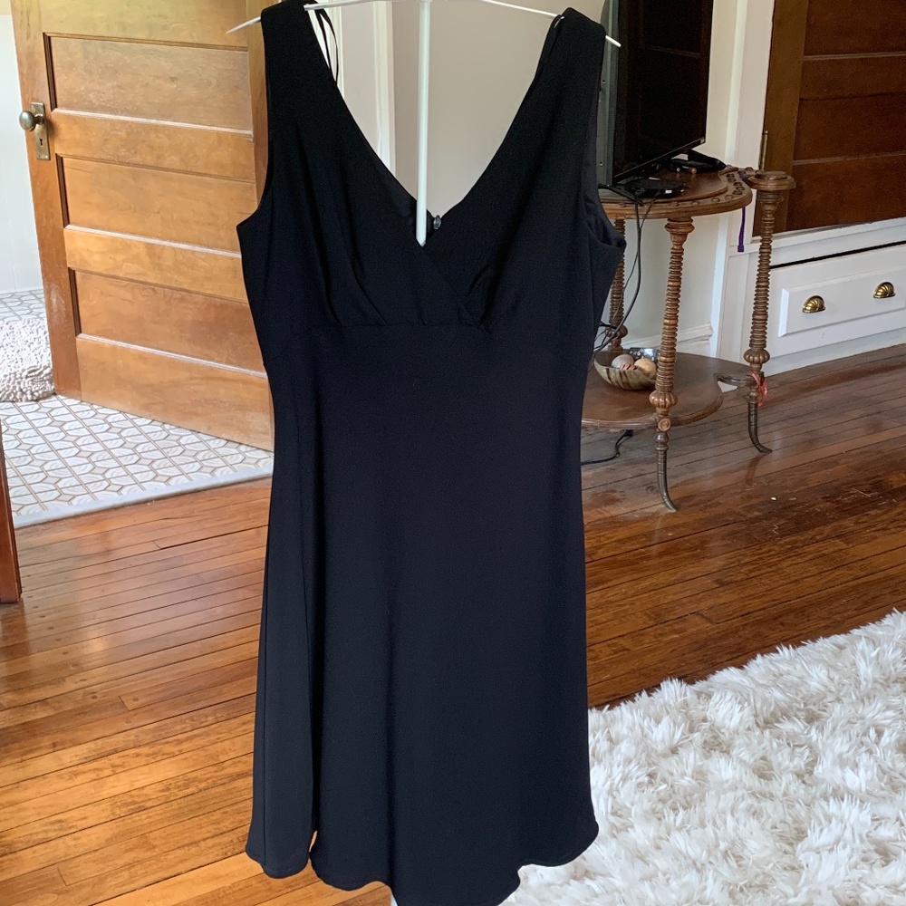 Gorgeous Talbots black cocktail dress. Never worn . Retail 199